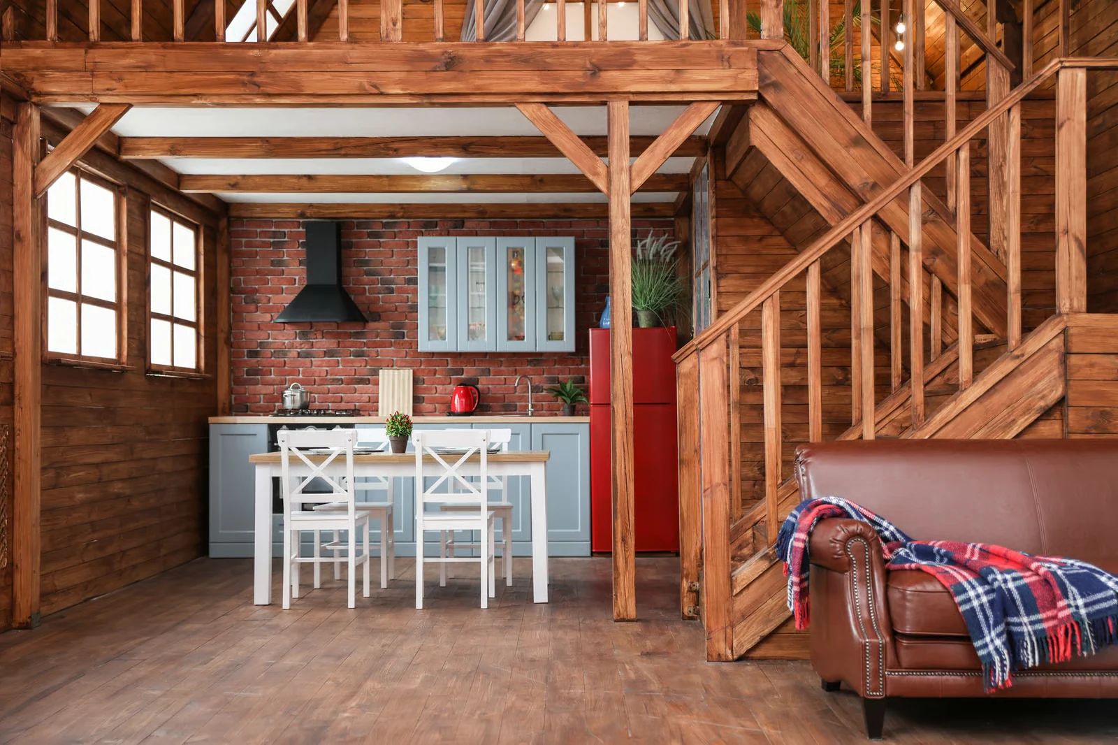 Photo. Barndominium interior, exposed frame and stair from the living side